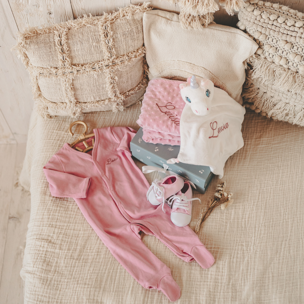 Baby clothing, Pink onesie, Baby shoes, Unicorn plush, Blanket set