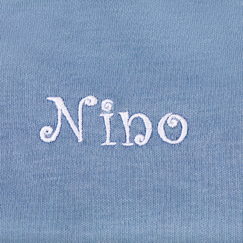 stickerei, Nim o, blauer Stoff, textlogo, edele textile