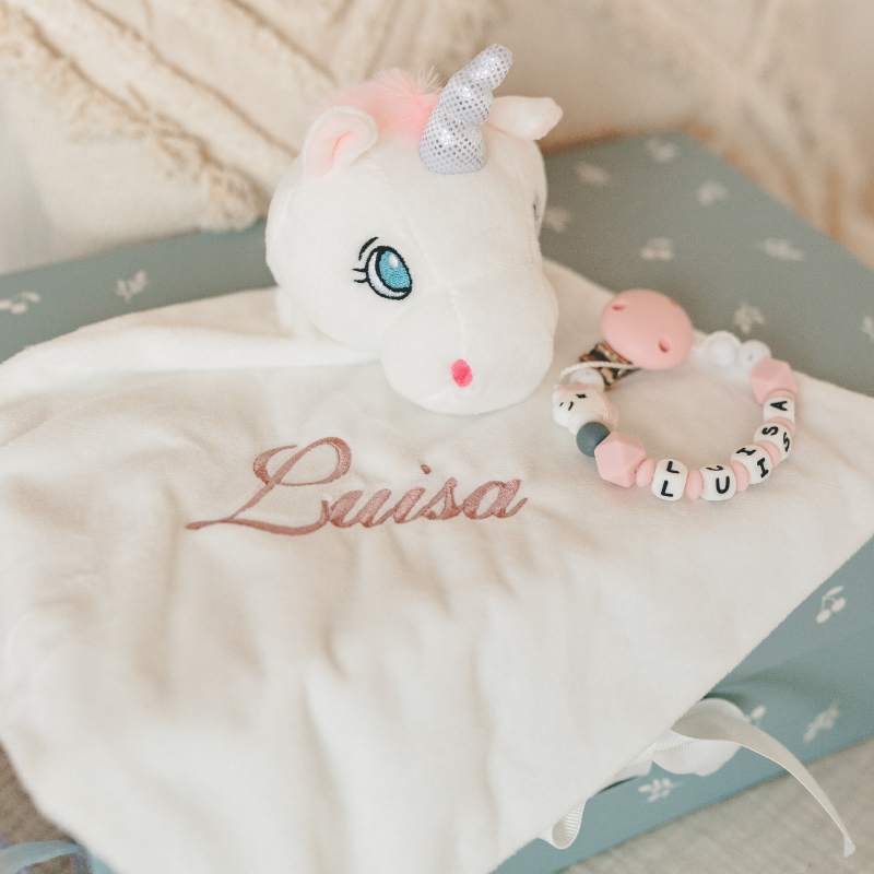 ausgefallenes unicorn, gestopfteunicorn, blaues auge, rosa horn, personalisierte decke