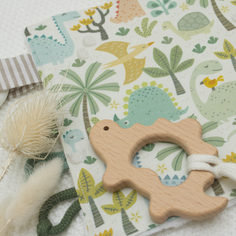 Baby-Spielzeug, Holzteether, Dinosaurien Muster, Baumwollstoff, Pastellfarben