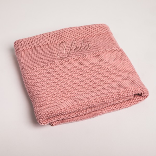 Couverture en tricot, rose